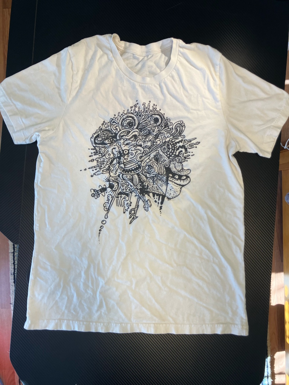 Men's White Graphic Tee with Abstract Black Print